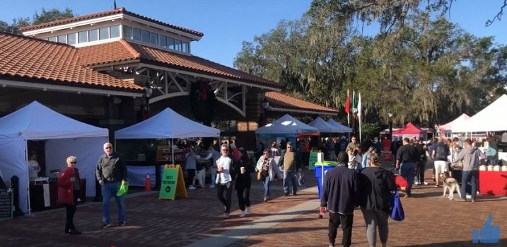 A view of the Winter Garden Farmers Market with fresh produce and flowers